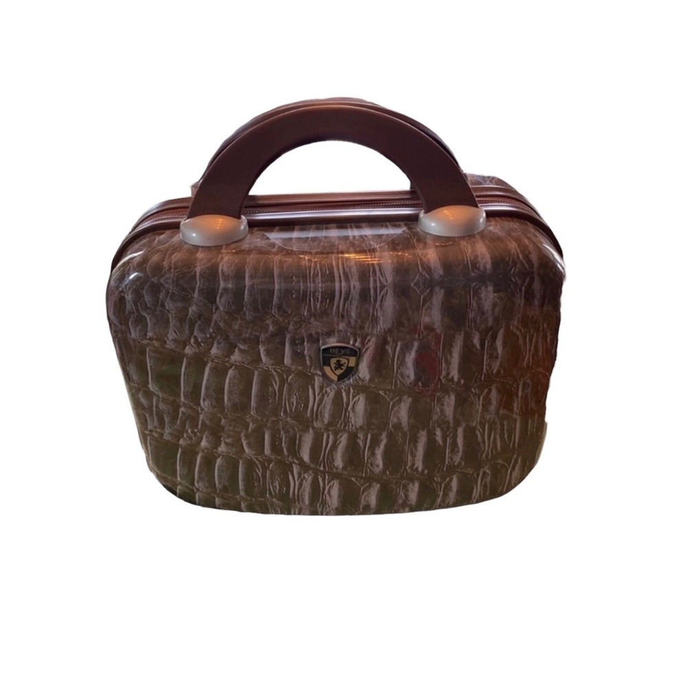 Heys travel mini purse. You can pack It safely in one place. Hard Shell.
